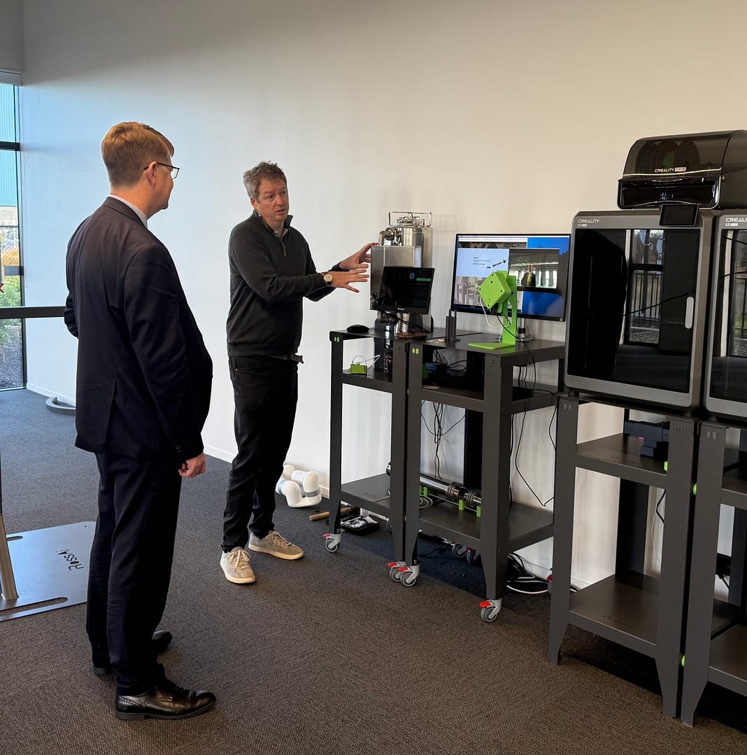 Callum Ross, RossAi, describing his new Ai products to His Excellency Laurence Meredith 