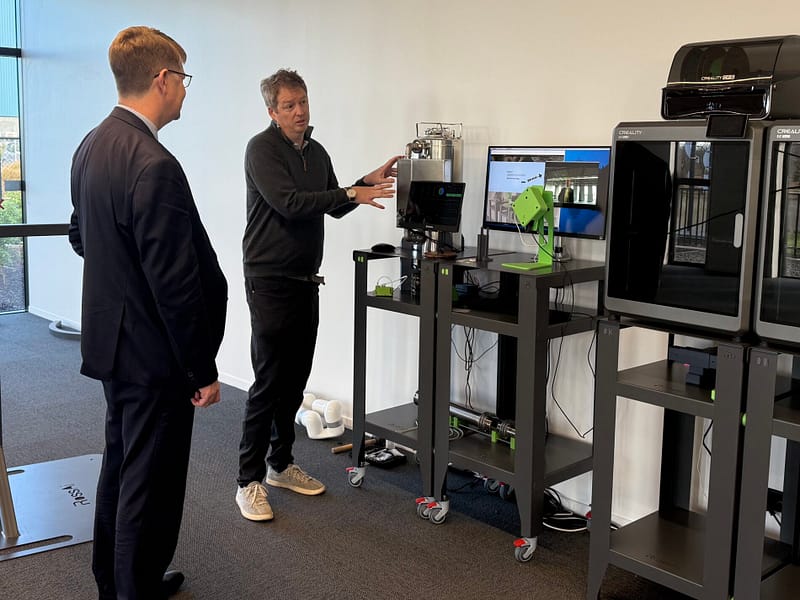 Callum Ross, RossAi, describing his new Ai products to His Excellency Laurence Meredith, European Union Ambassador to New Zealand
